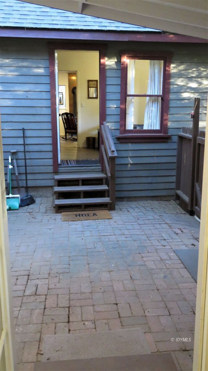 27300 Saunders Meadow Road Idyllwild, CA 92549 - Photo 29 of 39 a view of a house with a large window and wooden floor