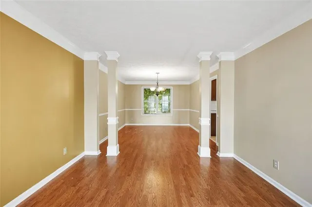 a view of livingroom with hardwood floor and a window