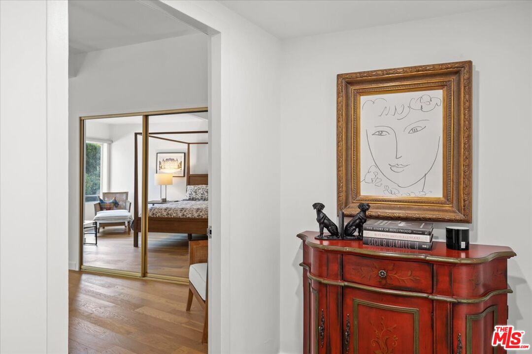 7250 Franklin Avenue, Unit 101 Los Angeles, CA 90046 - Photo 15 of 33 a room with chandelier fan and a dining table