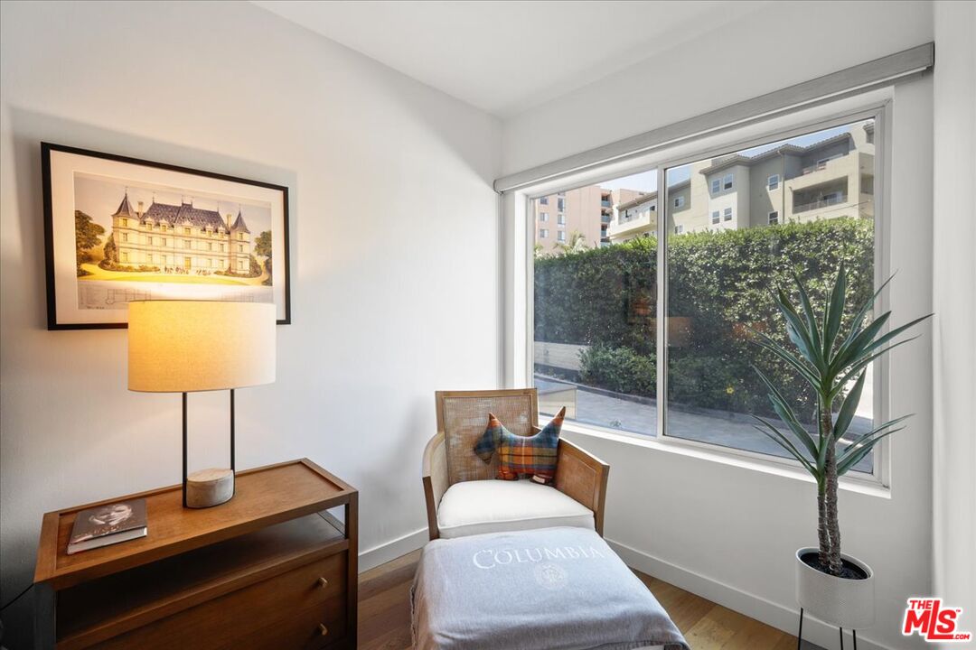 7250 Franklin Avenue, Unit 101 Los Angeles, CA 90046 - Photo 19 of 33 a living room with furniture and a potted plant
