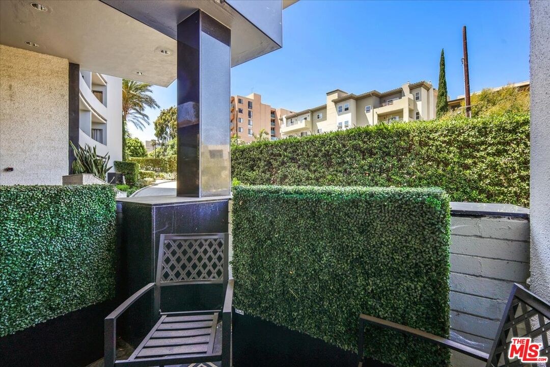 7250 Franklin Avenue, Unit 101 Los Angeles, CA 90046 - Photo 21 of 33 a balcony view with an outdoor seating space