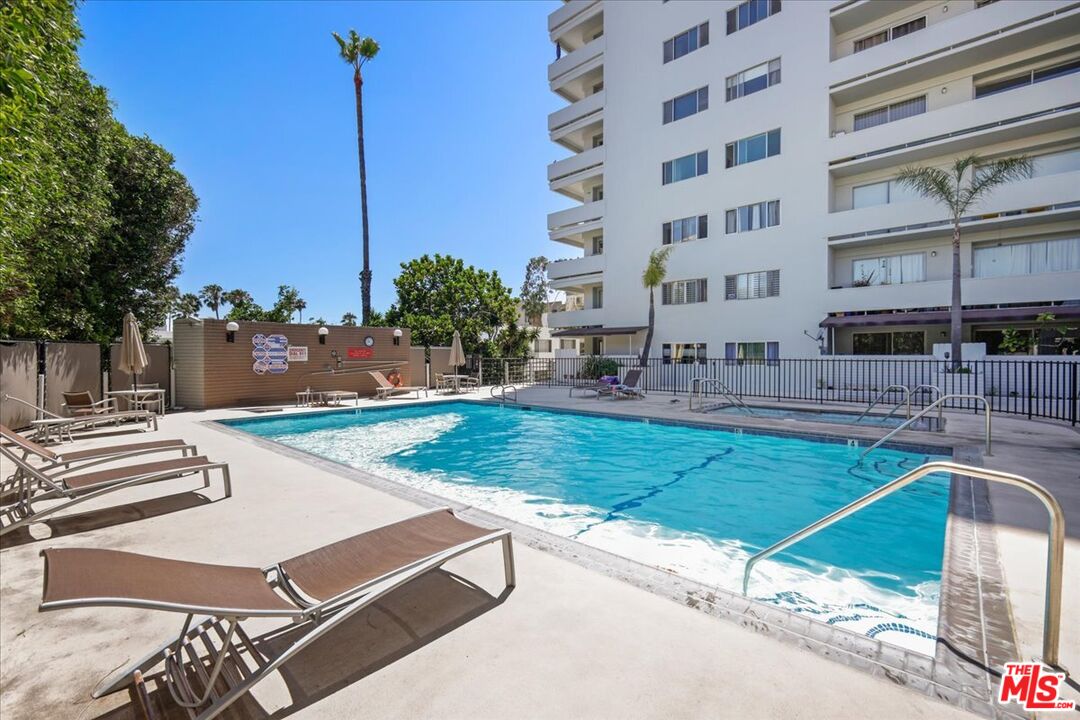 7250 Franklin Avenue, Unit 101 Los Angeles, CA 90046 - Photo 23 of 33 a view of a building with yard and sitting area