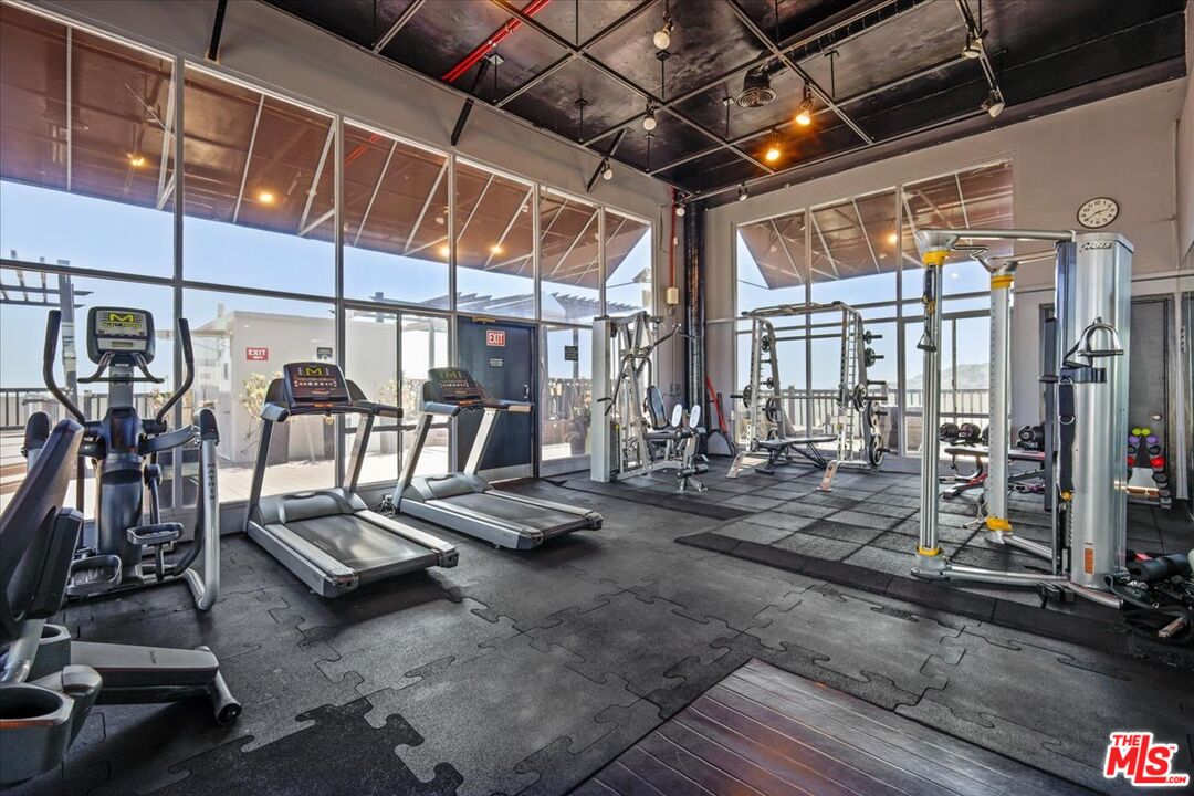 7250 Franklin Avenue, Unit 101 Los Angeles, CA 90046 - Photo 25 of 33 a view of a room with gym equipment