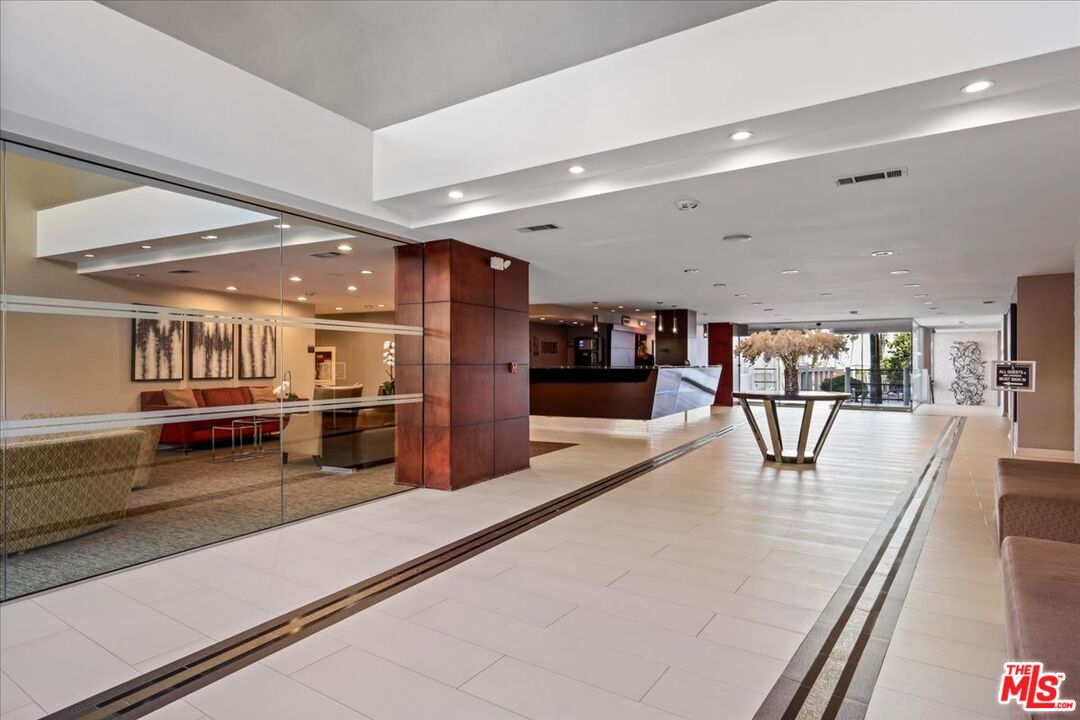 7250 Franklin Avenue, Unit 101 Los Angeles, CA 90046 - Photo 33 of 33 a view of a room with lots of wooden furniture