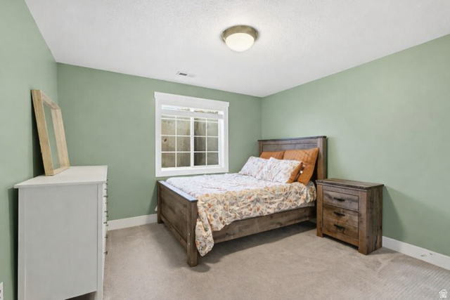 353 Robin Street Smithfield, UT 84335 - Photo 36 of 70 Bedroom featuring baseboards and light carpet