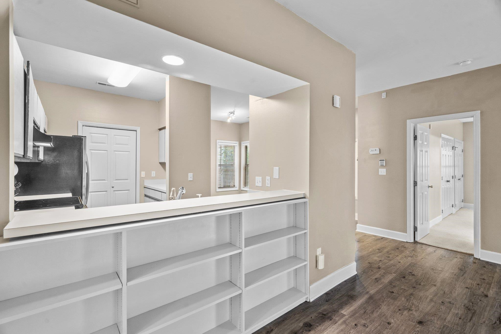 6121 Sunpointe Drive, Unit 103 Raleigh, NC 27606 - Photo 10 of 31 Built in Shelves