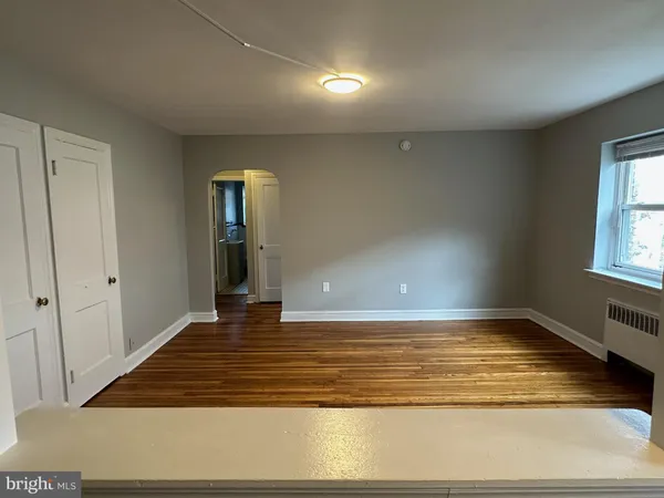 a view of an empty room and window