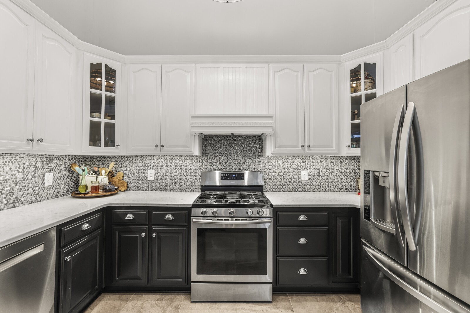 315 Eastside Road Burns, TN 37029 - Photo 23 of 57 a kitchen with stainless steel appliances granite countertop a stove and a refrigerator