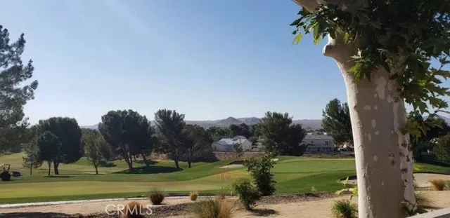 a view of a golf course with a park