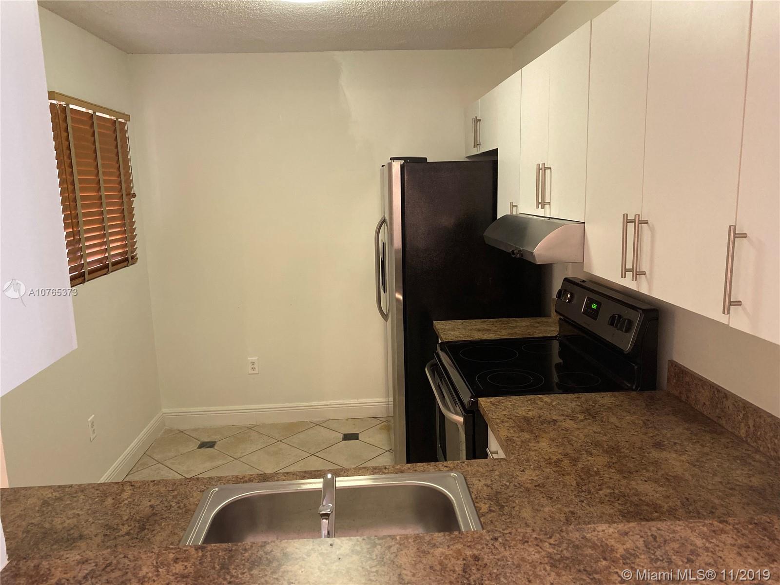 1111 Northwest 125th Path, Unit 107 Miami, FL 33182 - Photo 2 of 27
