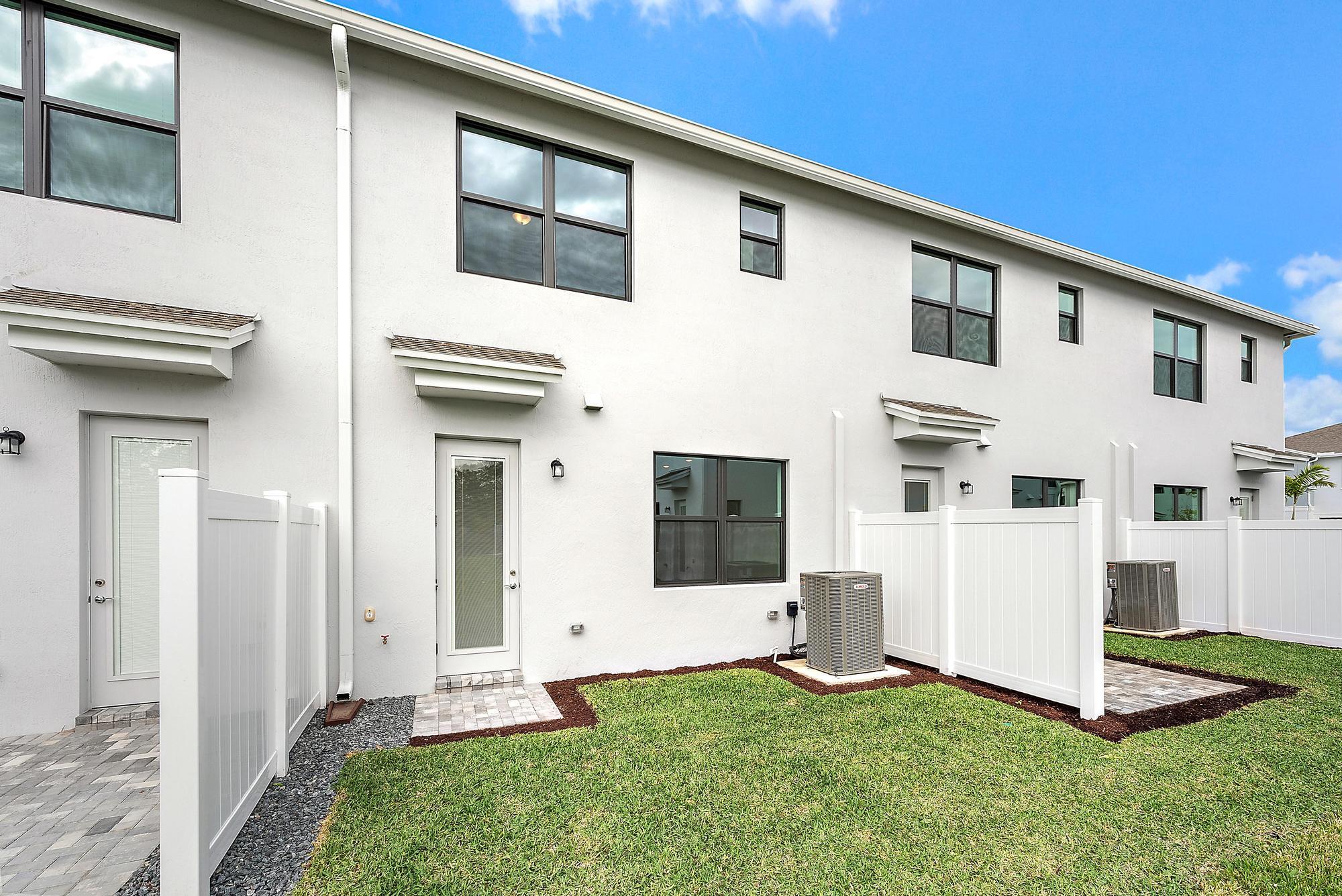 272 Southwest Sally Way Stuart, FL 34997 - Photo 20 of 25 Back Exterior