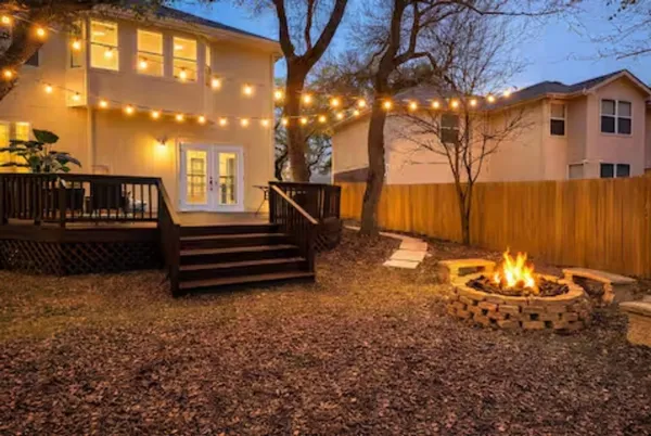 a view of a dining room with furniture and window