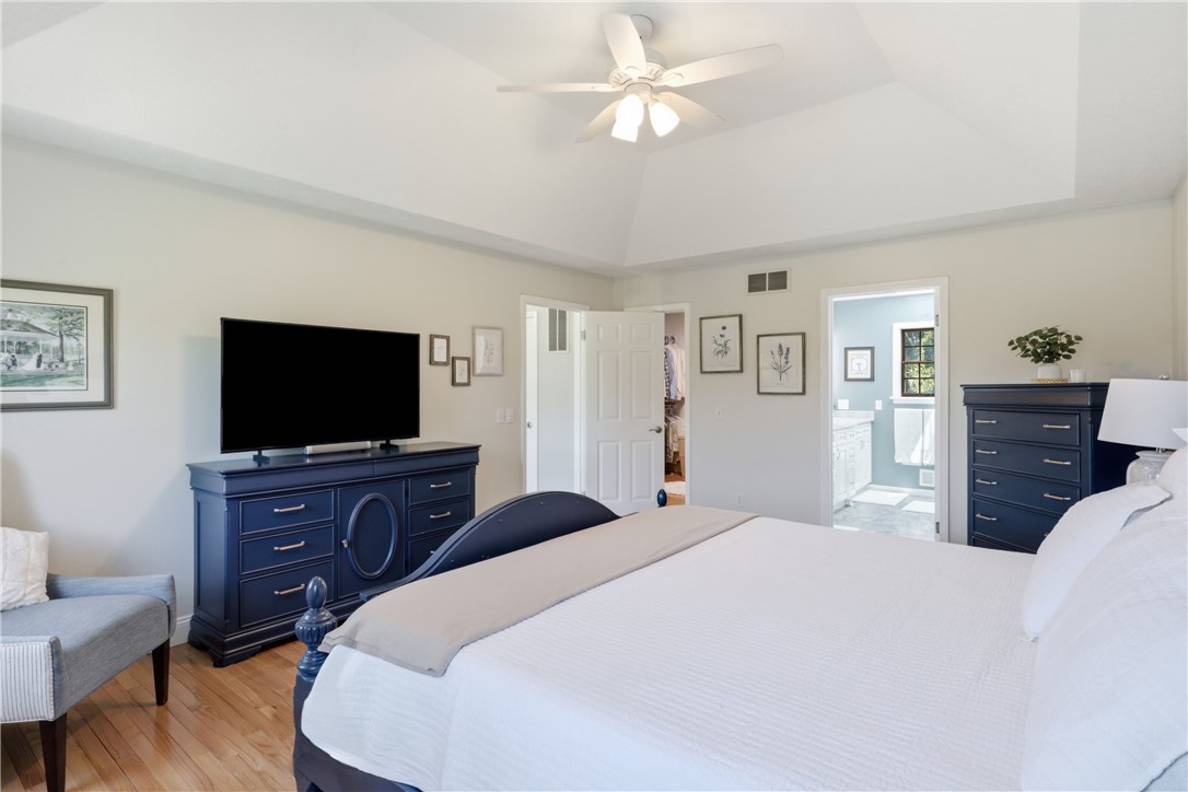 2057 Stirnie Road Victor, NY 14564 - Photo 24 of 48 Another perspective of the grand primary suite highlights its exceptional square footage, providing more than enough space for a king-sized bed set along with an integrated private sitting or dressing area.