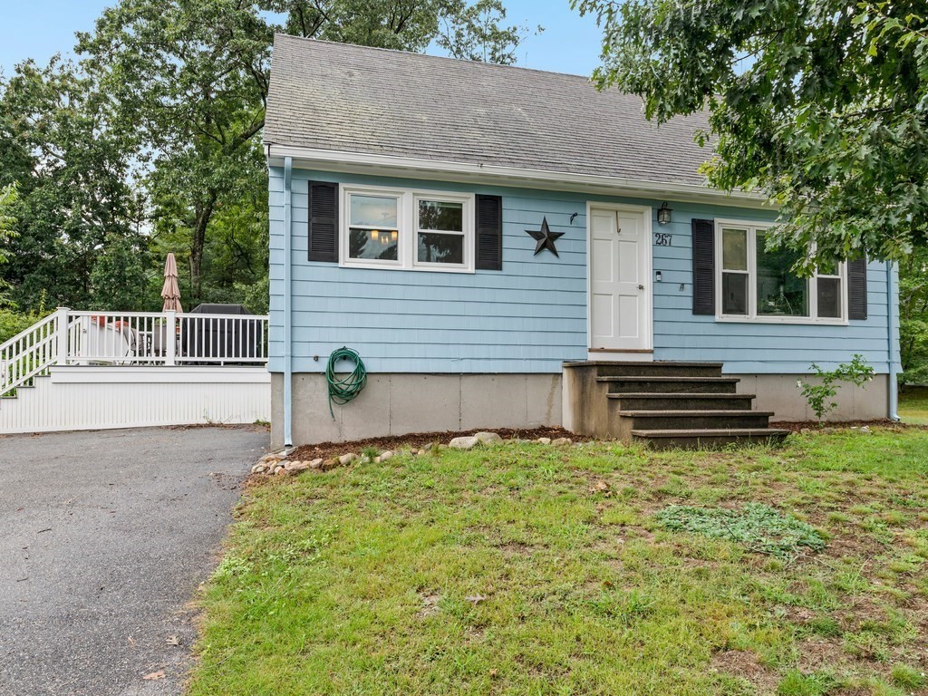 267 Salem Road Billerica, MA 01821 - Photo 1 of 27 a house view with a garden space