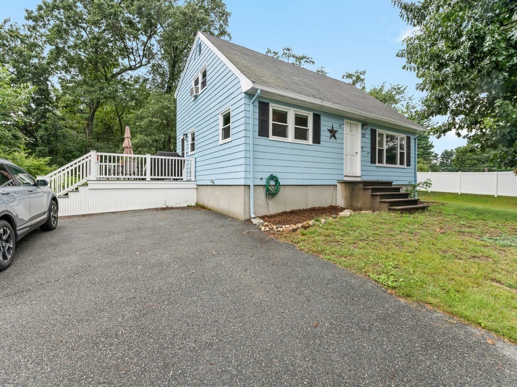 267 Salem Road Billerica, MA 01821 - Photo 2 of 27 a view of a house with a yard and a large tree