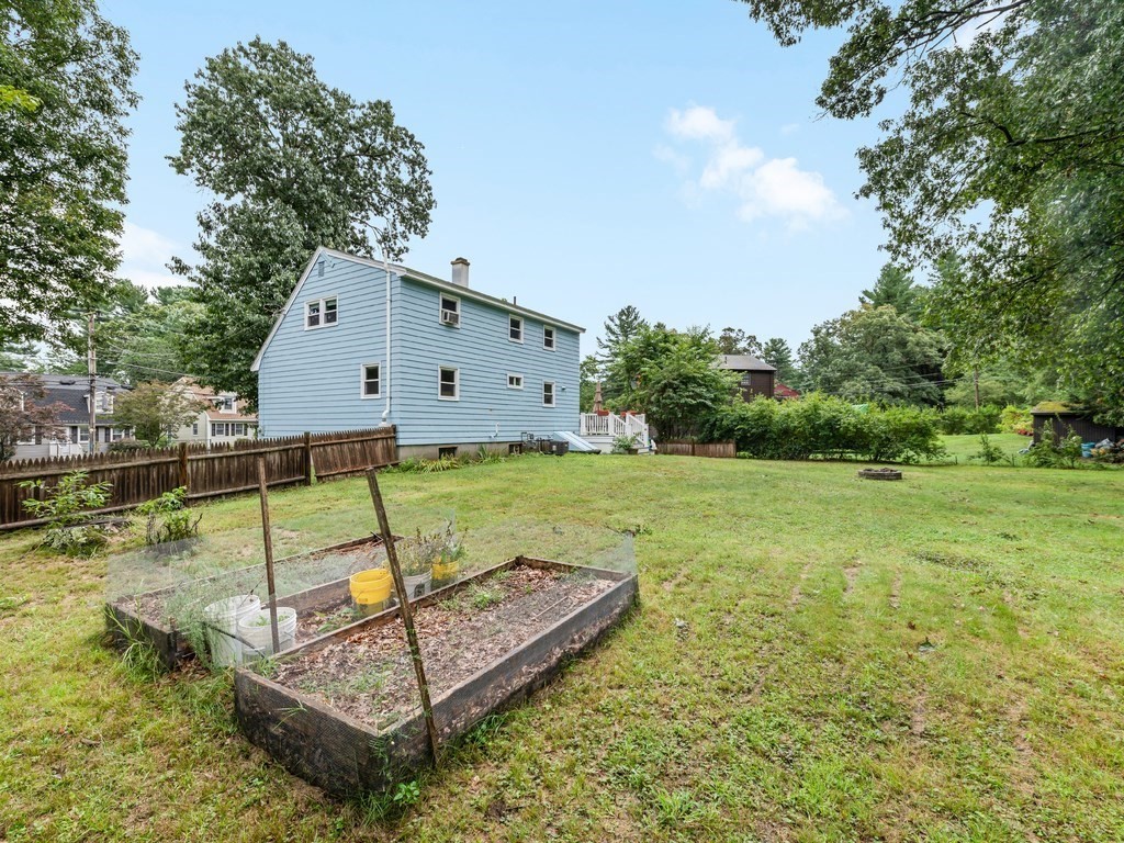 267 Salem Road Billerica, MA 01821 - Photo 22 of 27 a view of a backyard with a small pool