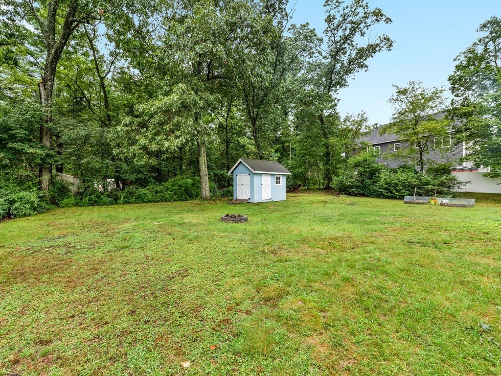267 Salem Road Billerica, MA 01821 - Photo 24 of 27 a house view with a garden space