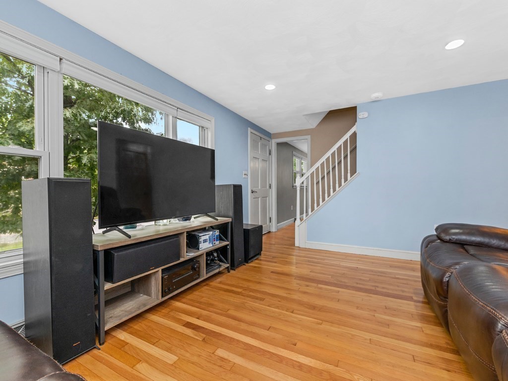 267 Salem Road Billerica, MA 01821 - Photo 8 of 27 a room with wooden floor and furniture