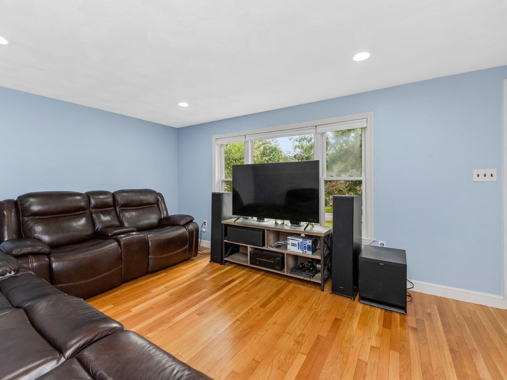 267 Salem Road Billerica, MA 01821 - Photo 10 of 27 a living room with furniture and a flat screen tv