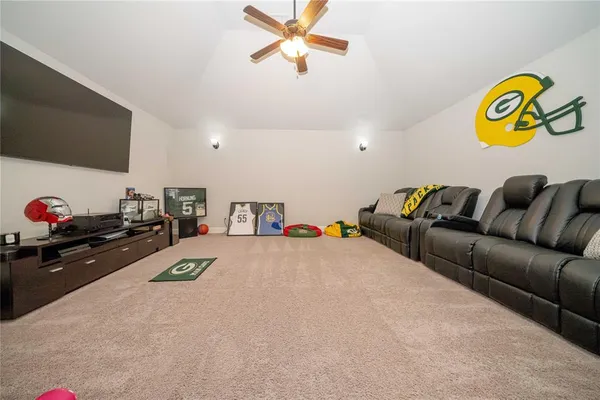 a bedroom with a bed and a table in it