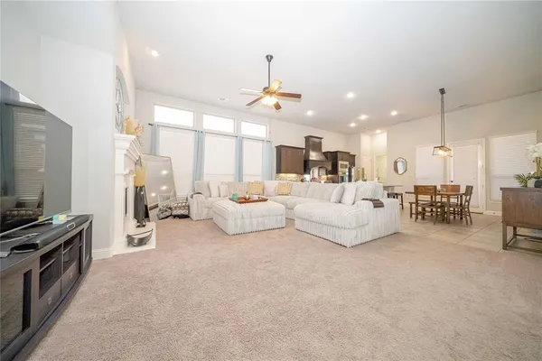 a bedroom with a bed and a fireplace