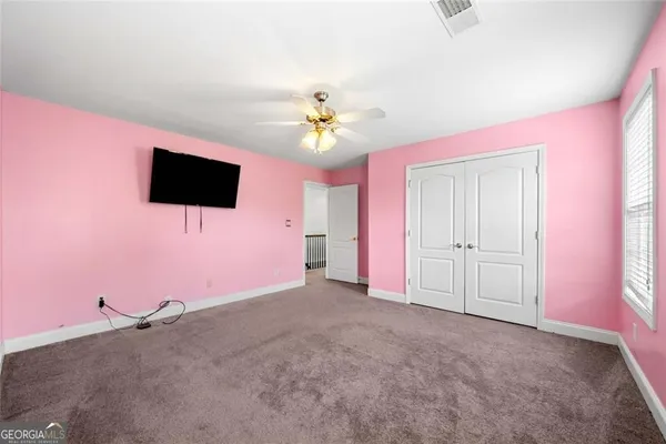 a view of a livingroom with a flat screen tv