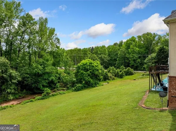 a view of an outdoor space and a yard