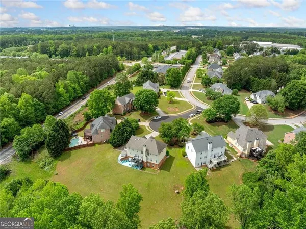 an aerial view of residential house with outdoor space