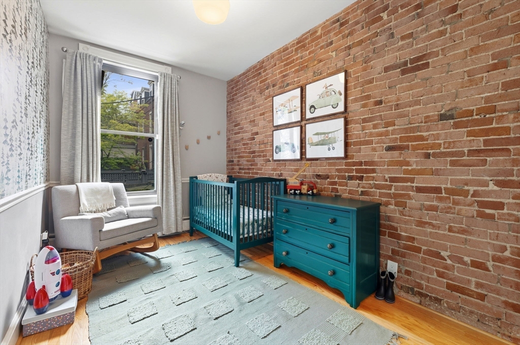 35 High Street, Unit 1 Boston, MA 02129 - Photo 8 of 33 a living room with furniture wooden floor and a window
