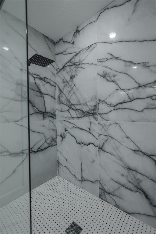 1808 Corolla Court Deltona, FL 32738 - Photo 20 of 29 a bathroom with a shower