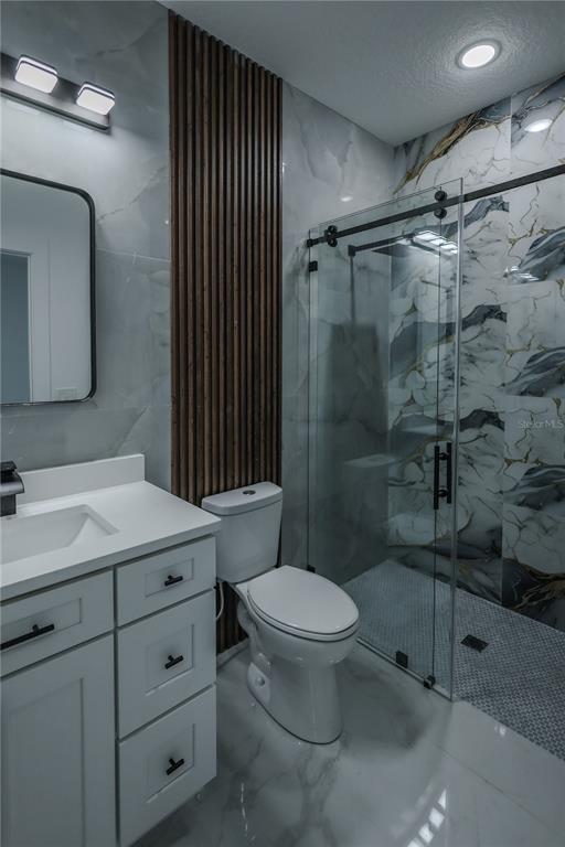 1808 Corolla Court Deltona, FL 32738 - Photo 21 of 29 a bathroom with a sink toilet and shower