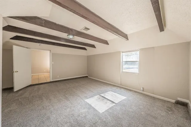 a view of a room with an empty space