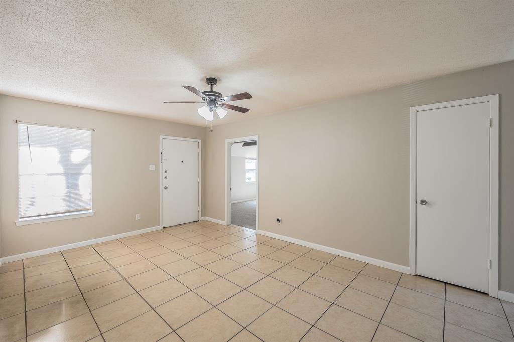 3029 Montclair Place Denton, TX 76209 - Photo 4 of 39 a view of an empty room with a window