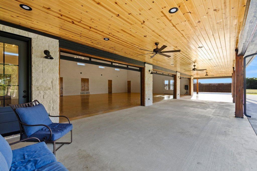 4251 Refuge Road Sherman, TX 75092 - Photo 14 of 40 a view of a porch with furniture and a yard