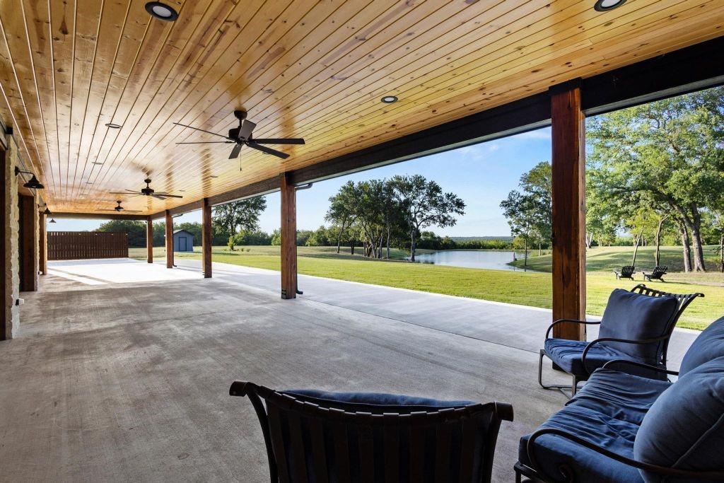 4251 Refuge Road Sherman, TX 75092 - Photo 16 of 40 a view of a swimming pool with a porch
