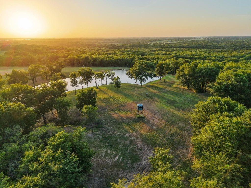 4251 Refuge Road Sherman, TX 75092 - Photo 39 of 40 an aerial view of residential houses with outdoor space and trees