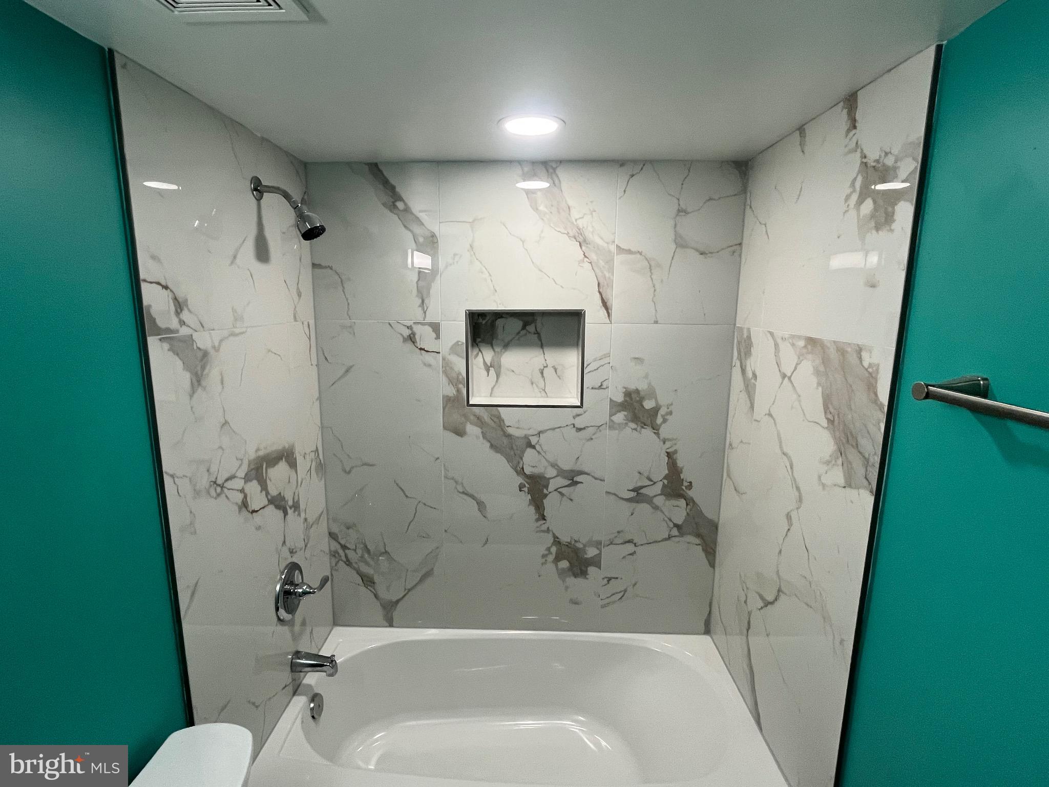 8607 Village Way, Unit 7/8607F Alexandria, VA 22309 - Photo 11 of 30 a bathroom with a toilet and a shower