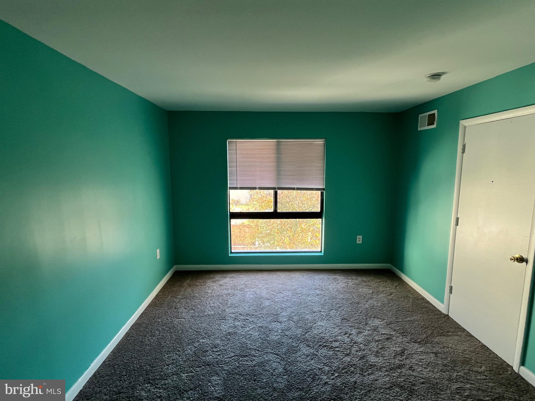8607 Village Way, Unit 7/8607F Alexandria, VA 22309 - Photo 12 of 30 an empty room with a window