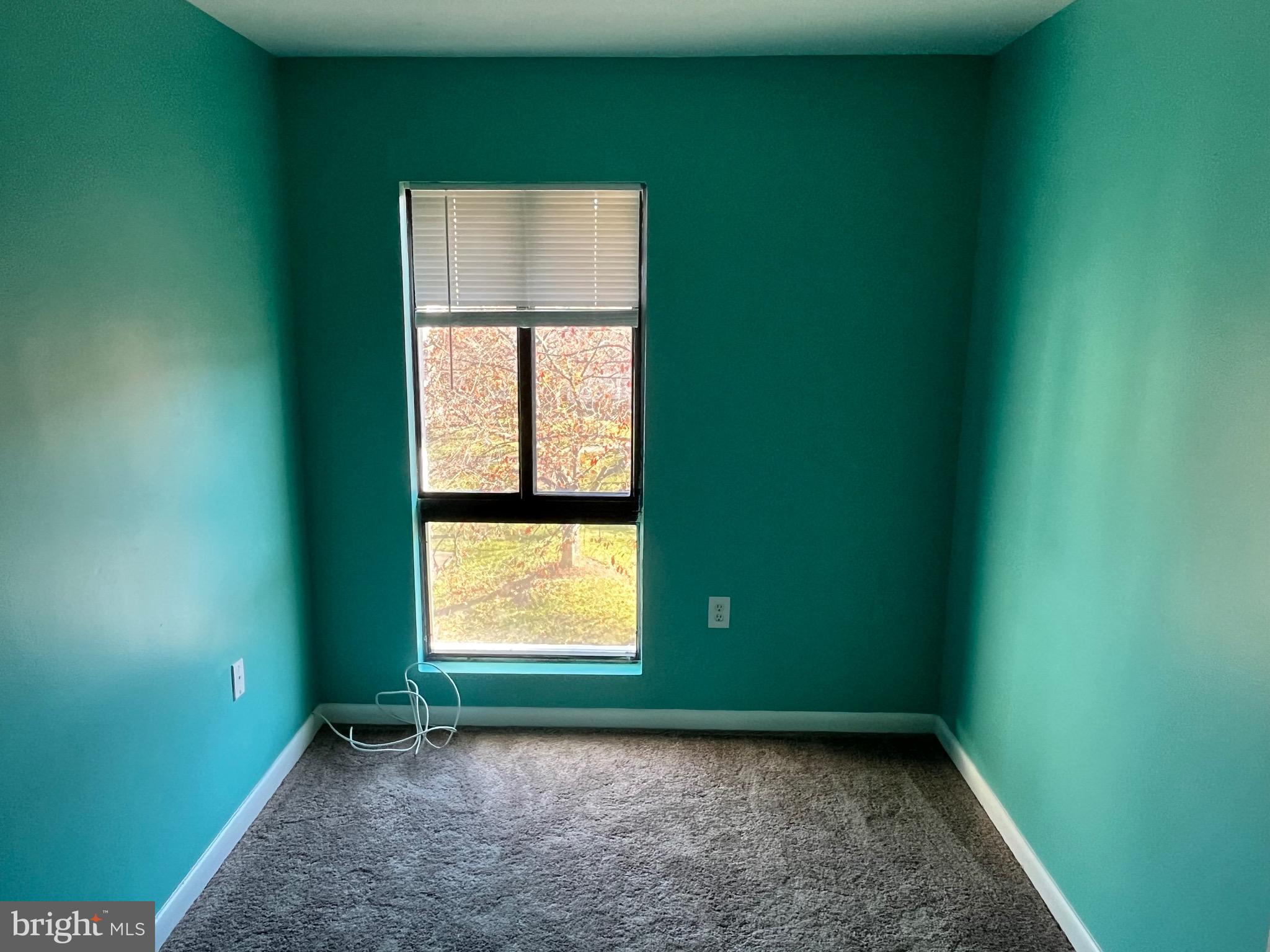 8607 Village Way, Unit 7/8607F Alexandria, VA 22309 - Photo 20 of 30 an empty room with a window