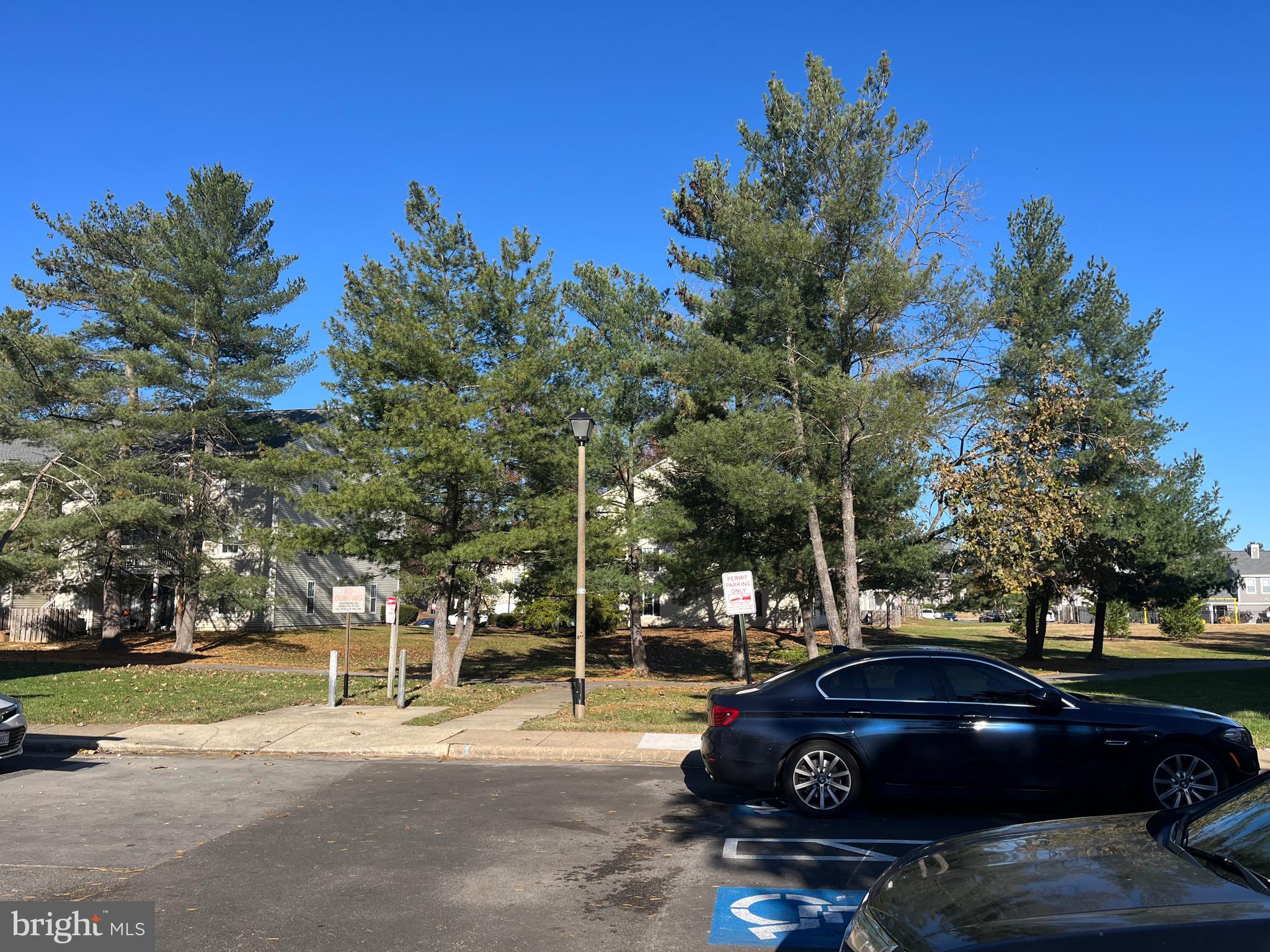 8607 Village Way, Unit 7/8607F Alexandria, VA 22309 - Photo 28 of 30 a cars parked on the side of a street