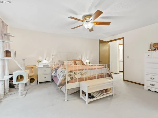 a bedroom with a bed and a closet