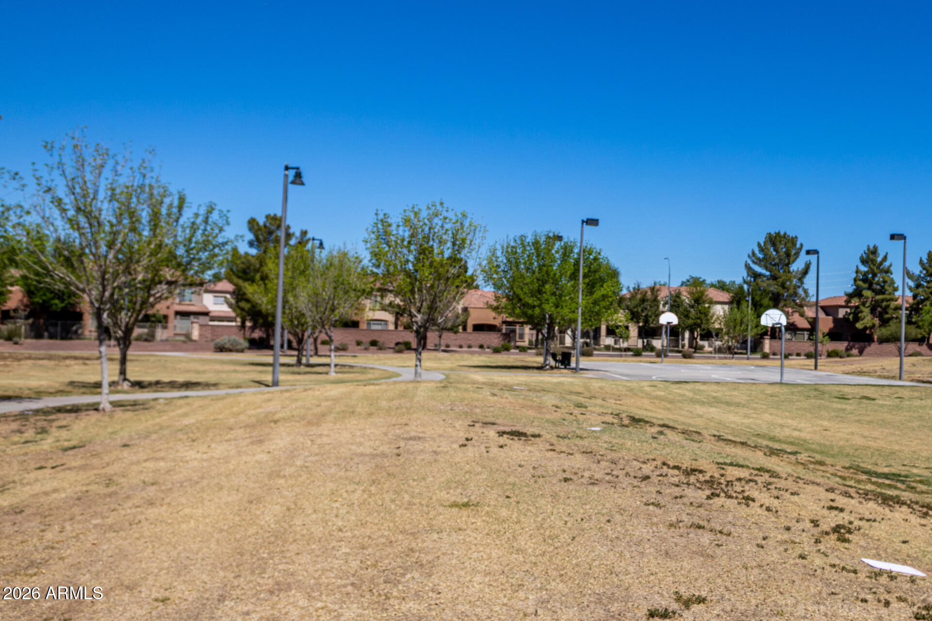 2600 East Springfield Place, Unit 109 Chandler, AZ 85286 - Photo 34 of 38 a view of a park with palm trees