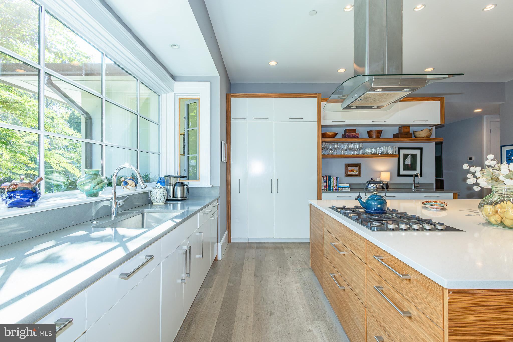 1004 Moss Haven Court Annapolis, MD 21403 - Photo 11 of 77 a kitchen with stainless steel appliances granite countertop a sink stove and cabinets