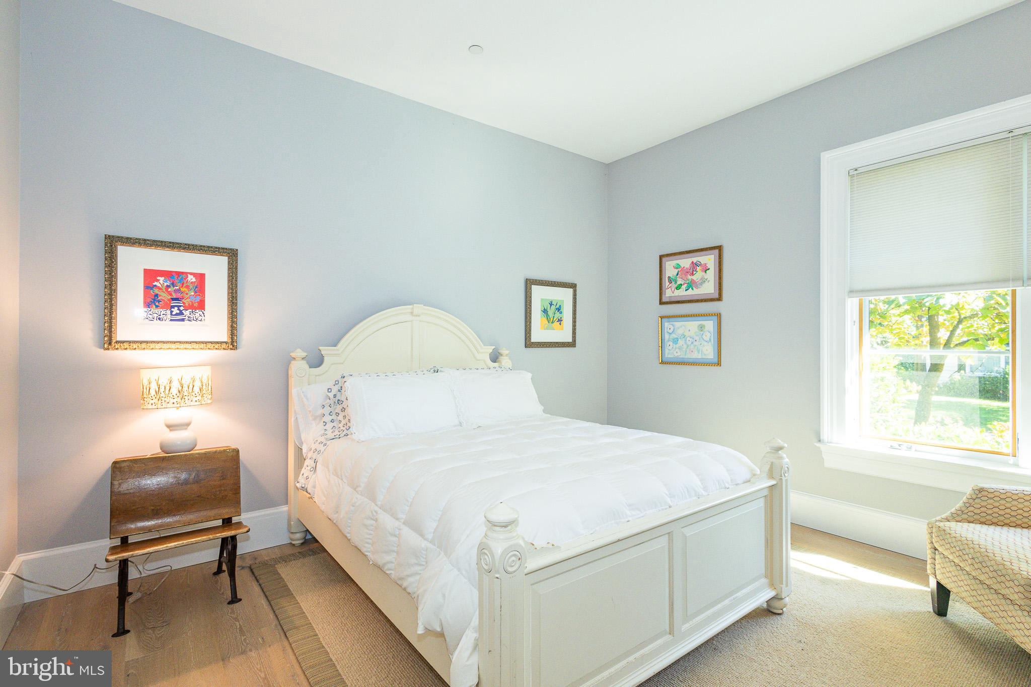 1004 Moss Haven Court Annapolis, MD 21403 - Photo 41 of 77 a bedroom with a bed and a window