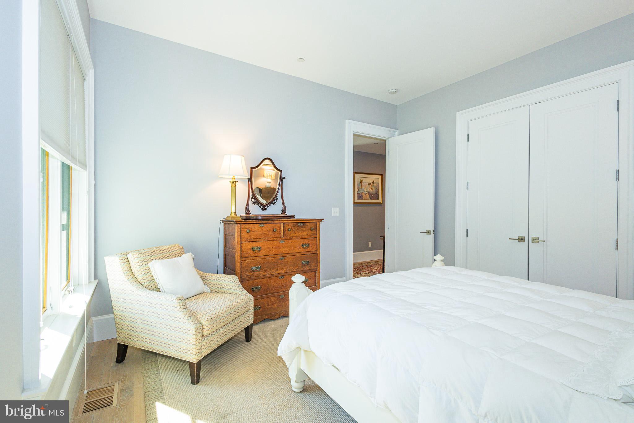 1004 Moss Haven Court Annapolis, MD 21403 - Photo 47 of 77 a bedroom with a bed and a couch