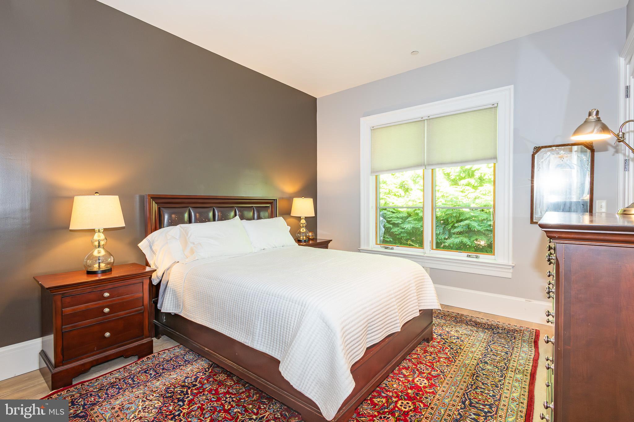 1004 Moss Haven Court Annapolis, MD 21403 - Photo 48 of 77 a bedroom with a bed and a window