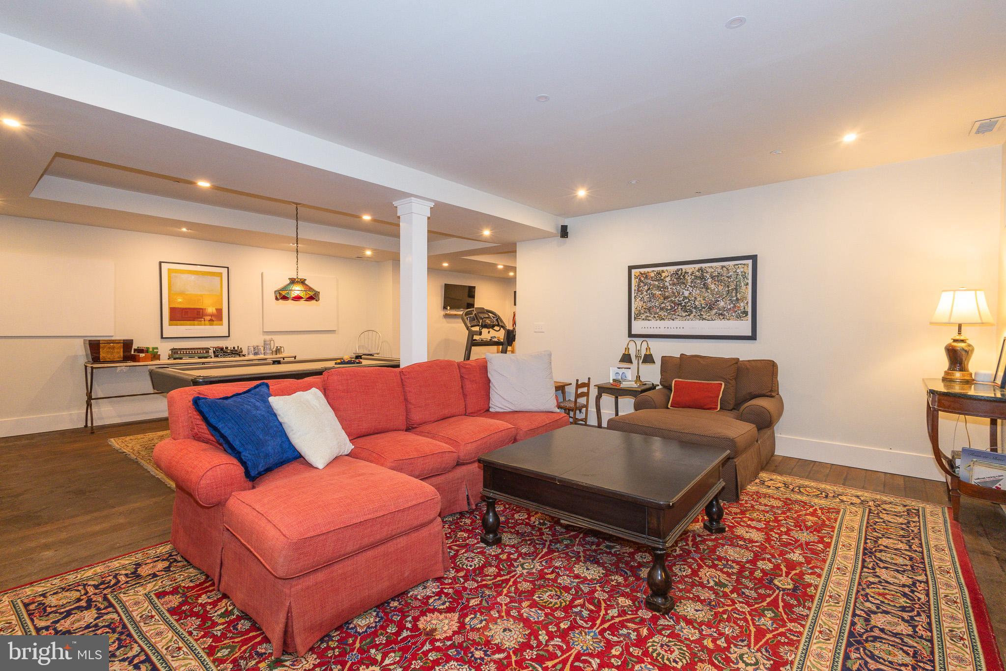 1004 Moss Haven Court Annapolis, MD 21403 - Photo 58 of 77 a living room with furniture and a rug