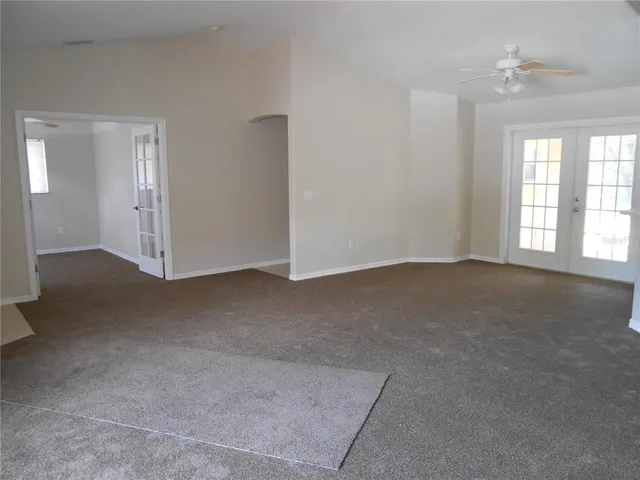 an empty room with windows