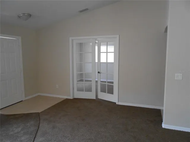 an empty room with closet