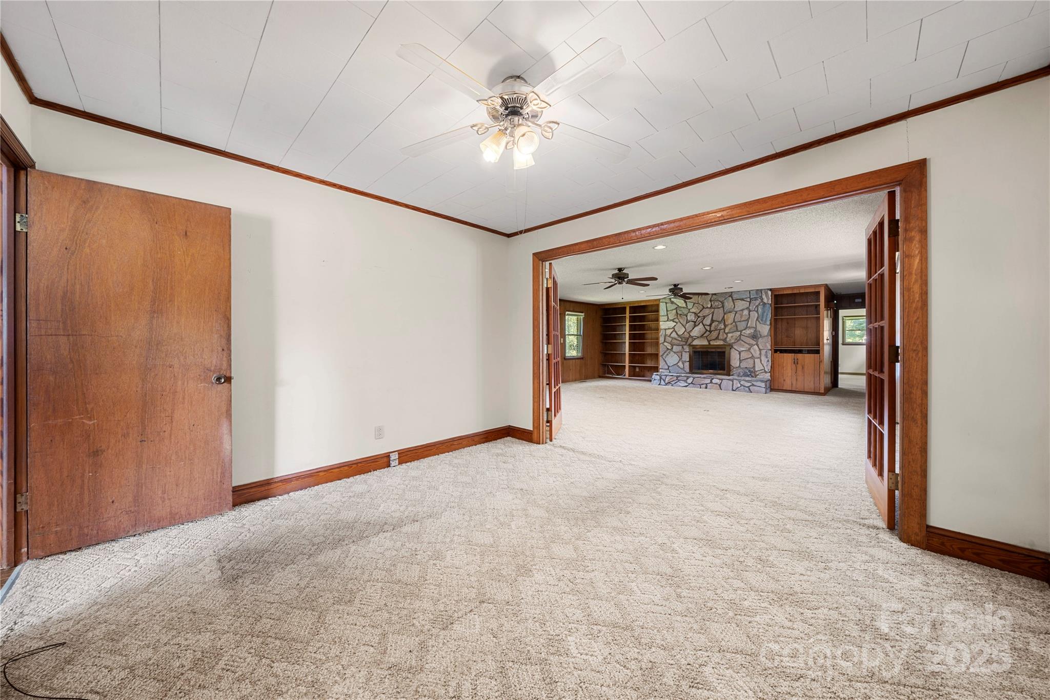 505 Rogers Lake Road East Kannapolis, NC 28083 - Photo 17 of 33 a view of an empty room with a ceiling fan